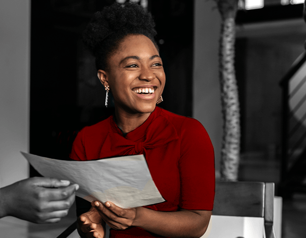 Woman holding report