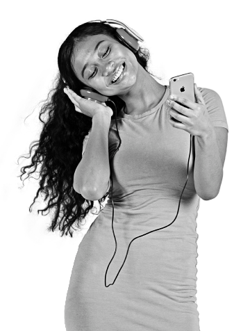 A woman smiling wearing headphones