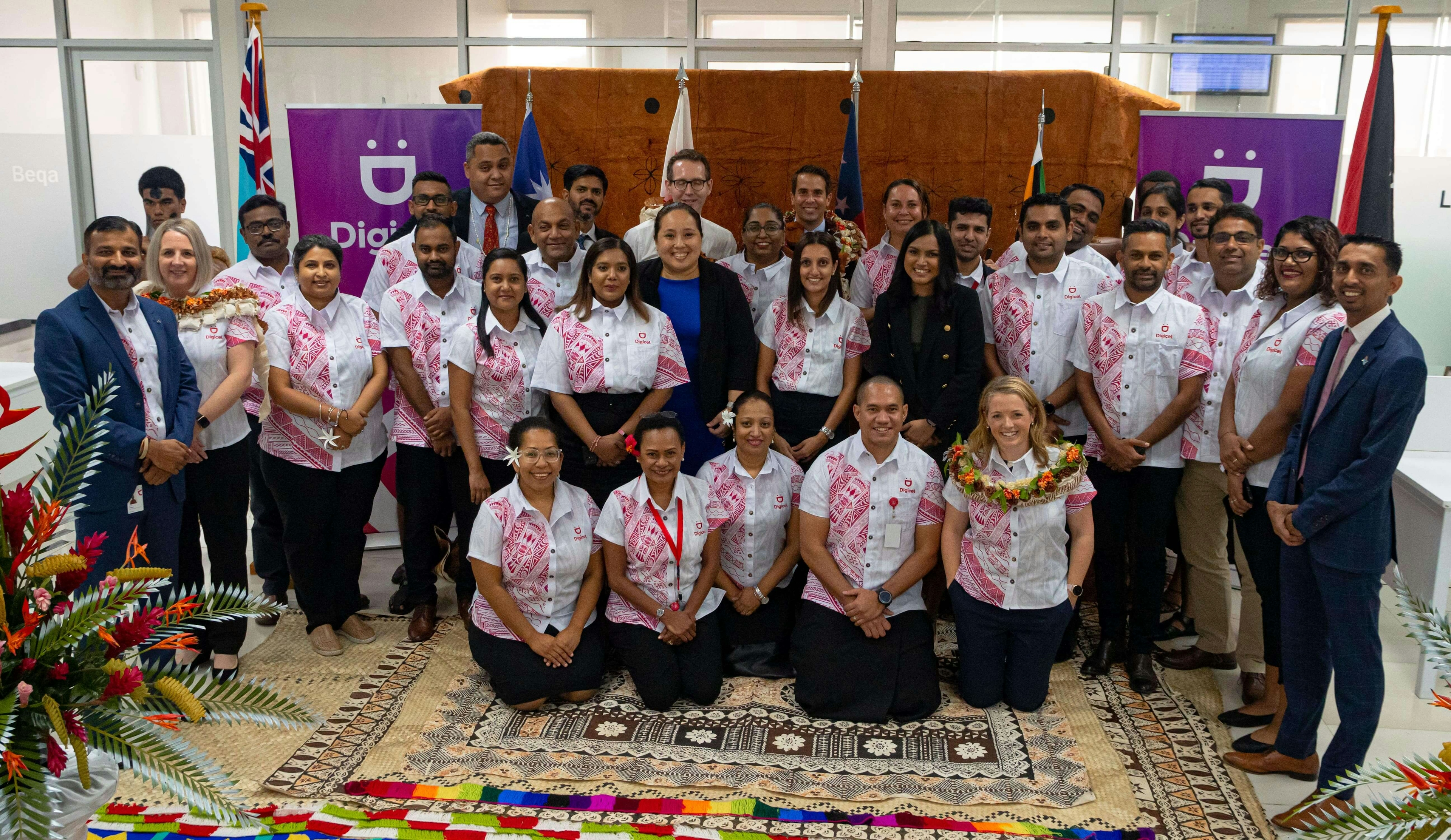 A group photo of Telstra and Digicel Pacific staff