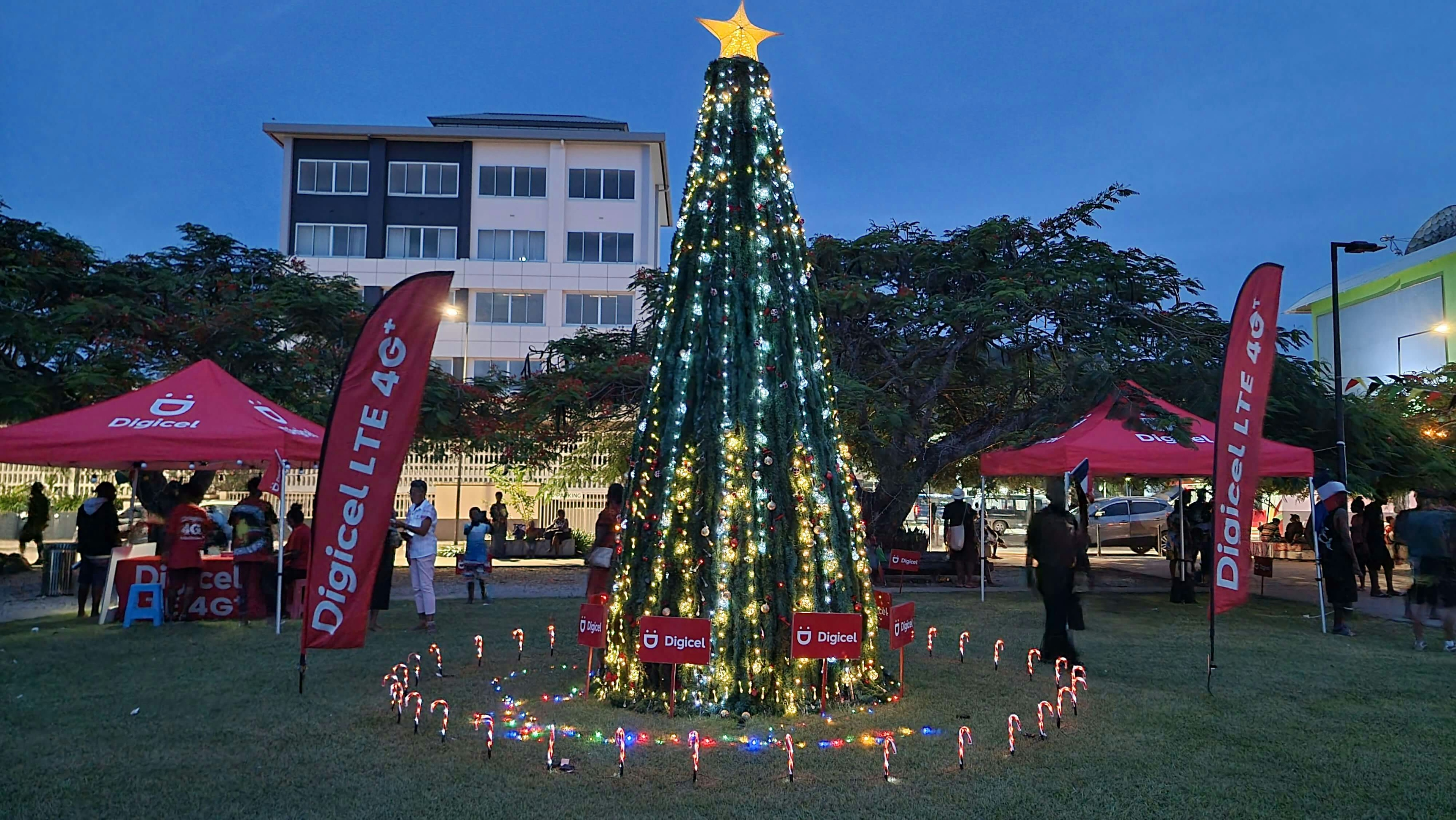 A large Christmas tree with a star on top at Feiwia Park, Port Vila